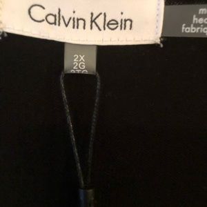 Calvin Klein V neck with faux white shirt-tail